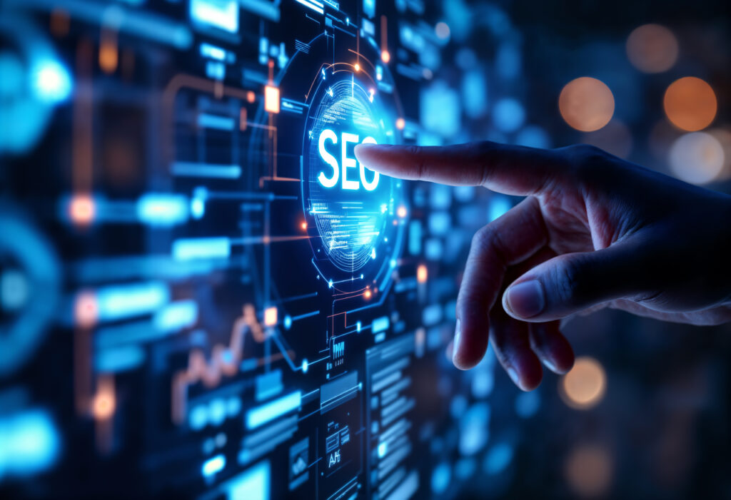 Hand touching a glowing SEO icon on a digital interface